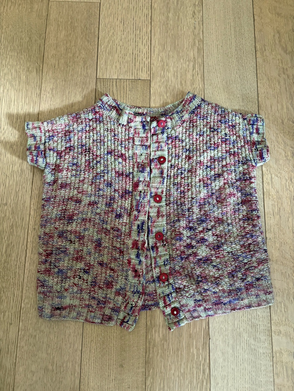 Hand knit short sleeved cardigan